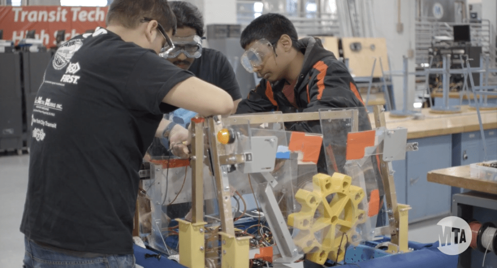 students working the boards