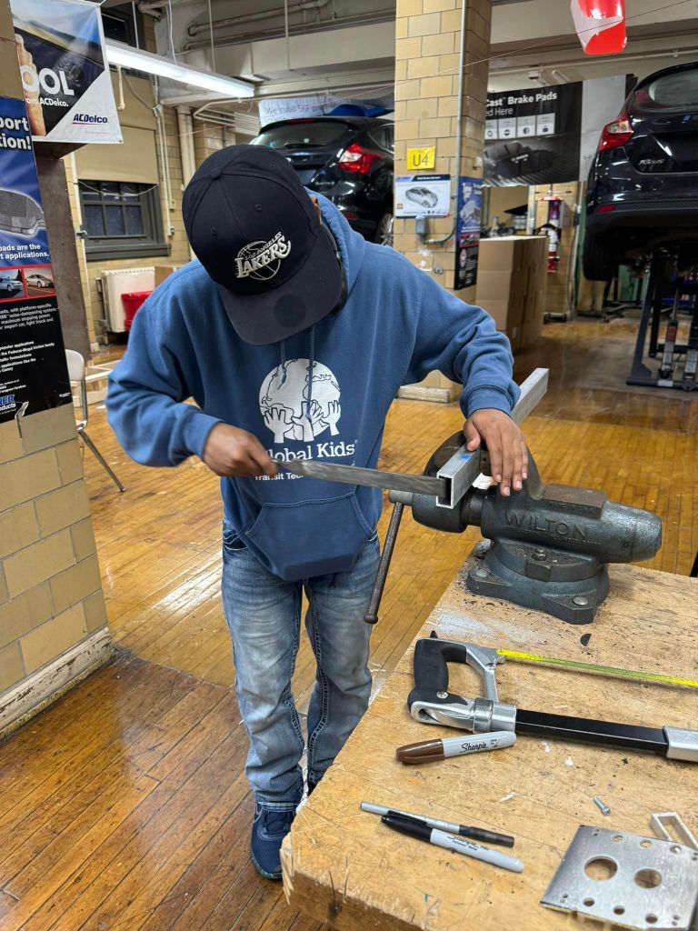 STUDENT WORKING IN A SHOP